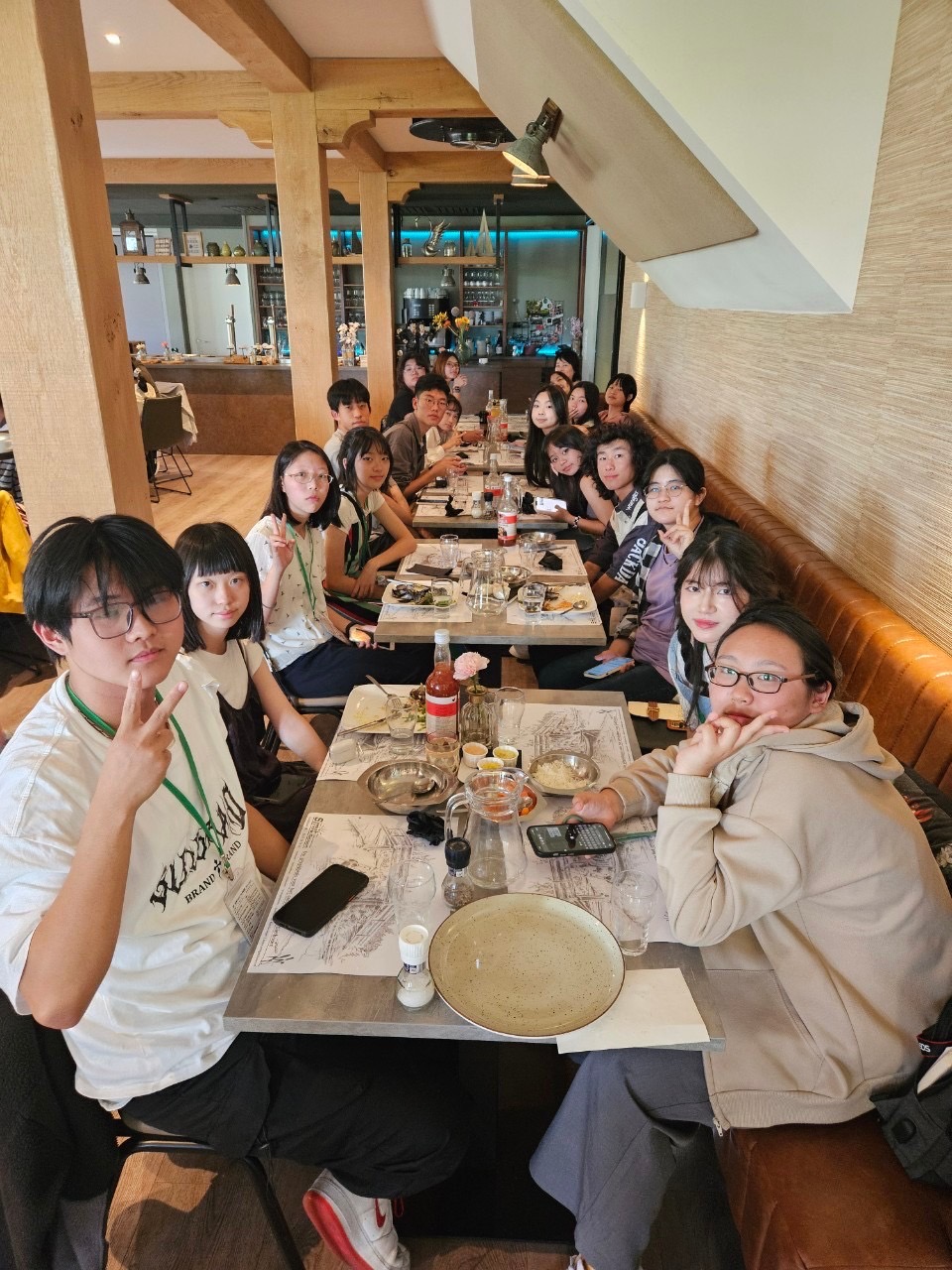 students conducting a curatorial meeting